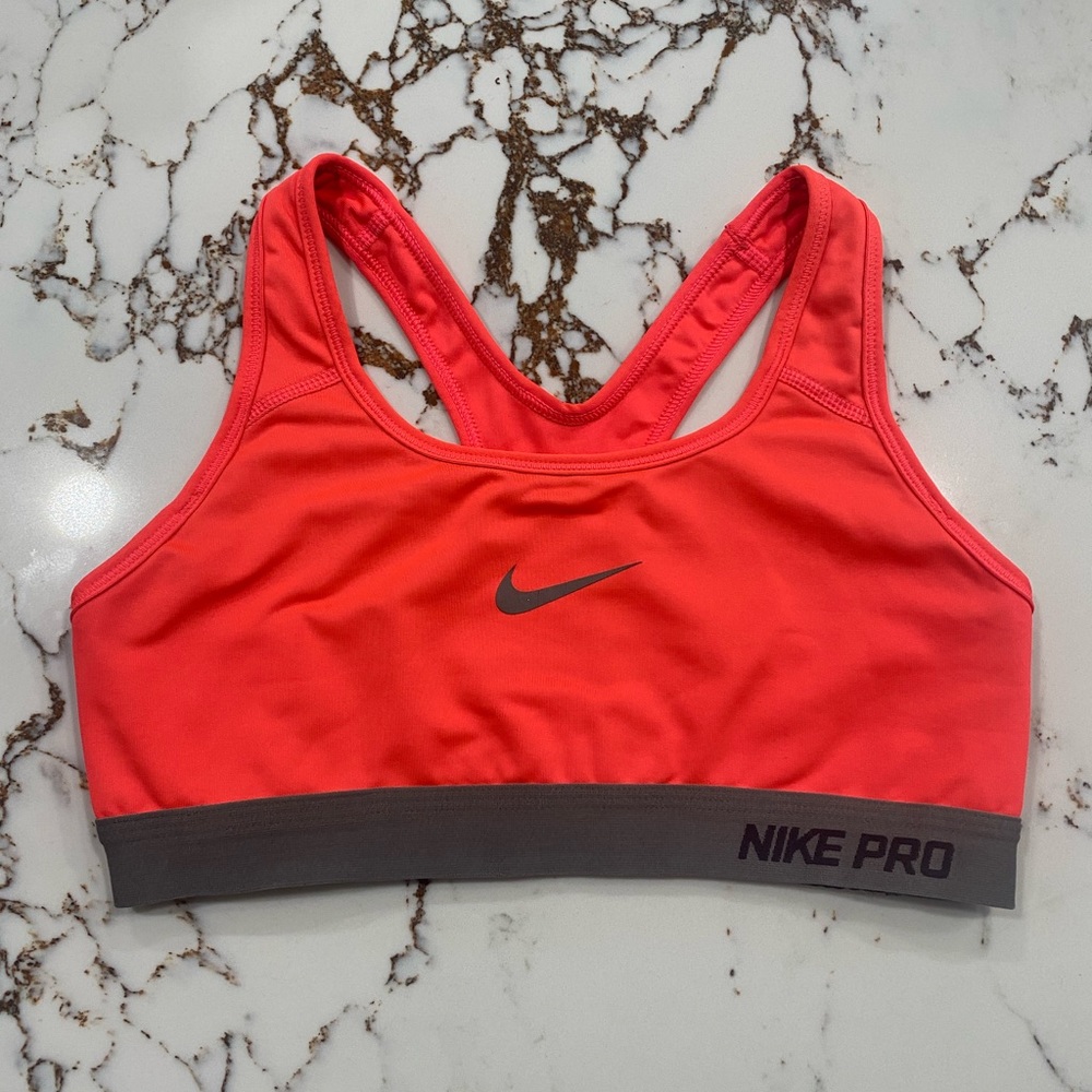 Neon pink Nike sports bra